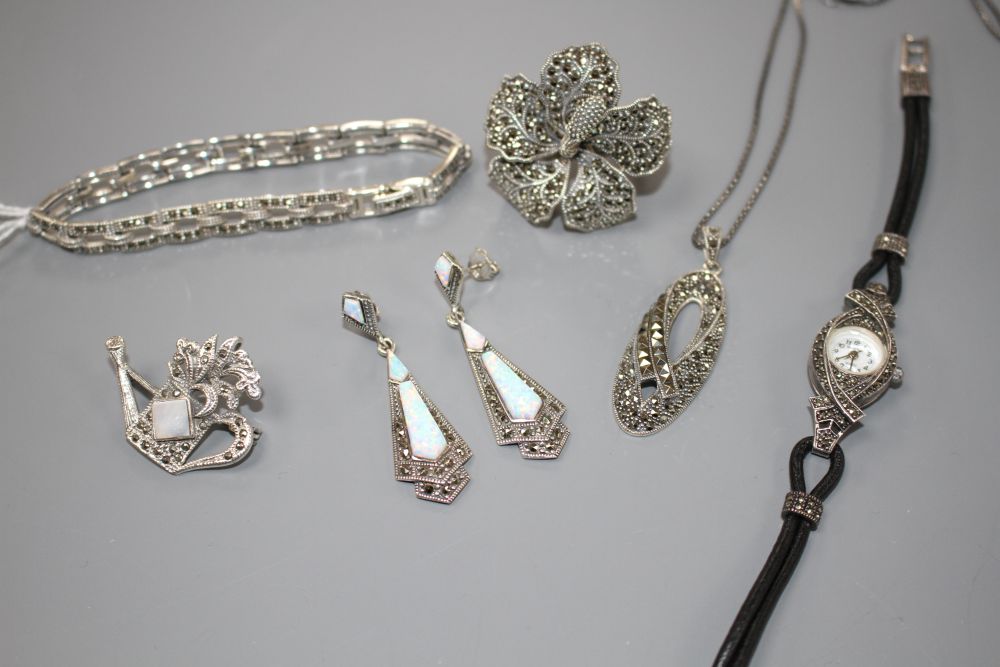 Six assorted items of marcasite jewellery including a pair of earrings, ring, brooch, bracelet and a Gianni Vecci ladys watch.